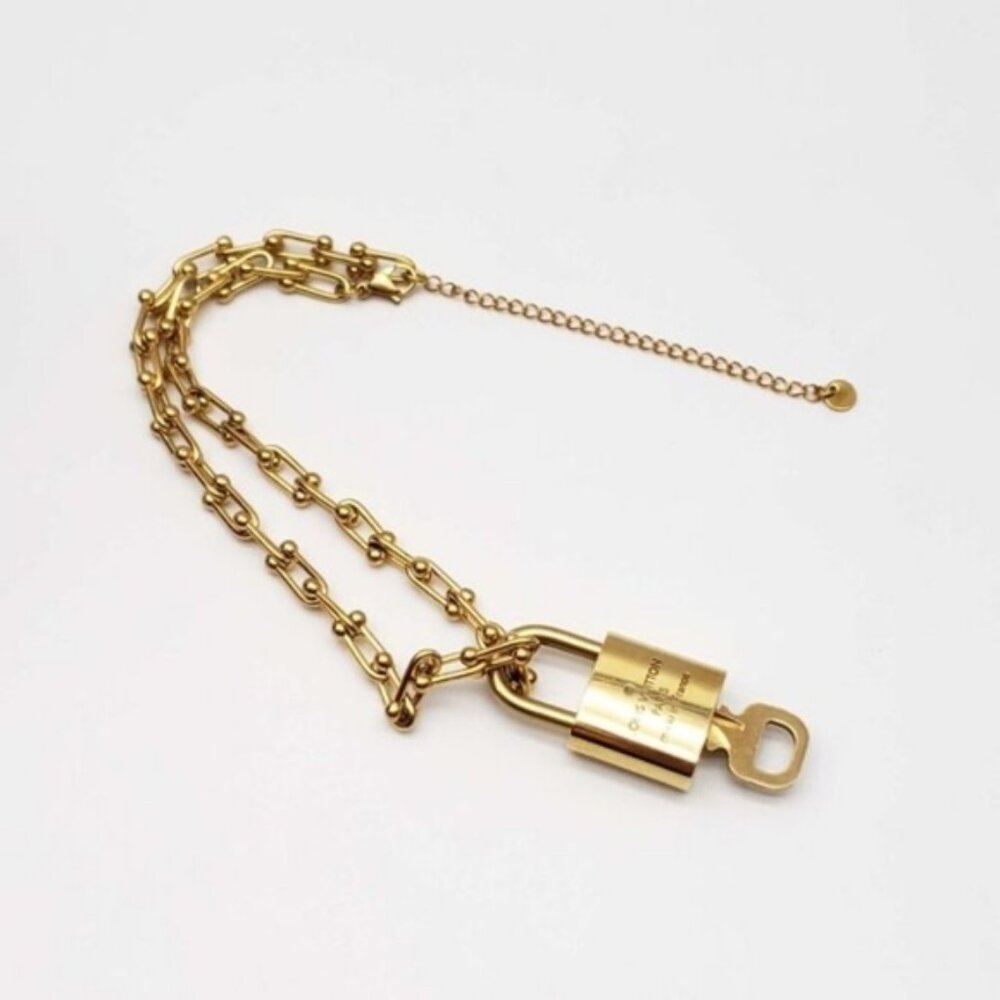 Authentic Louis Vuitton Lock and Key Gold Color with Gold Plated Chain Necklace - Picture 4 of 8